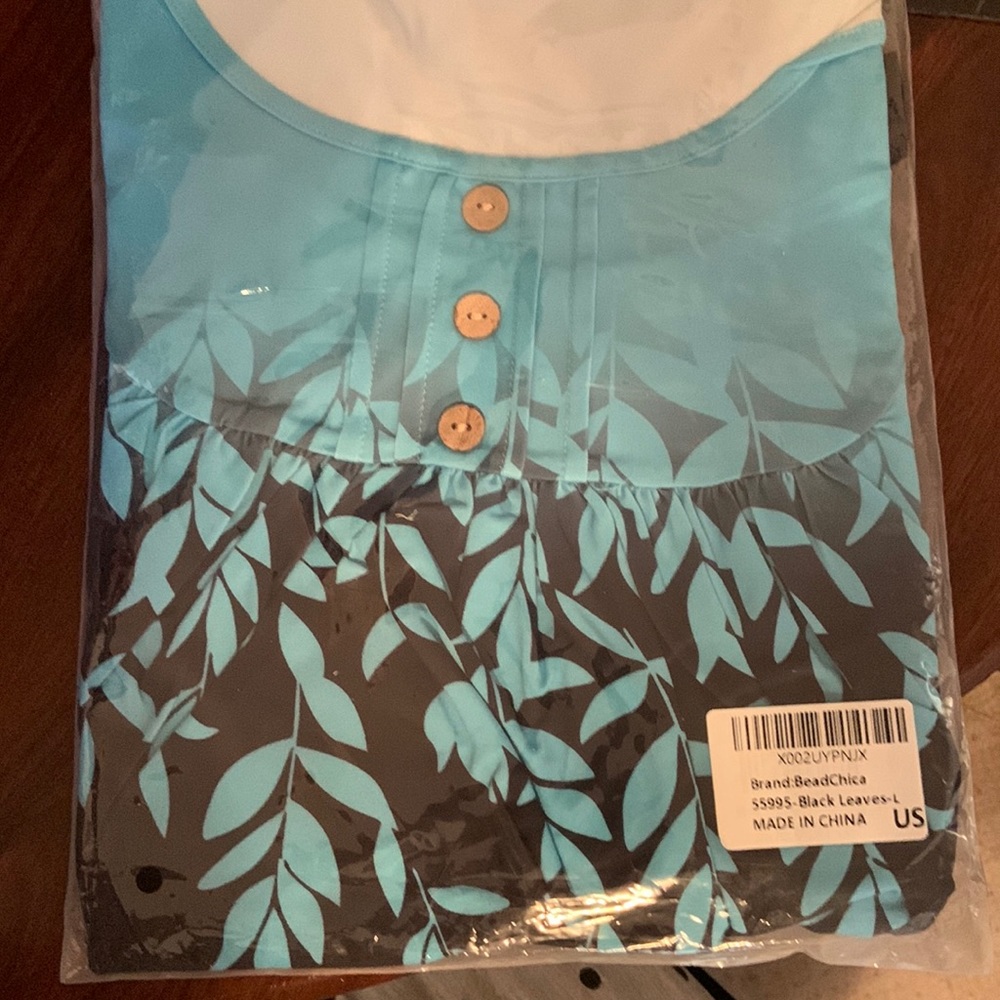 Ladies teal and black top